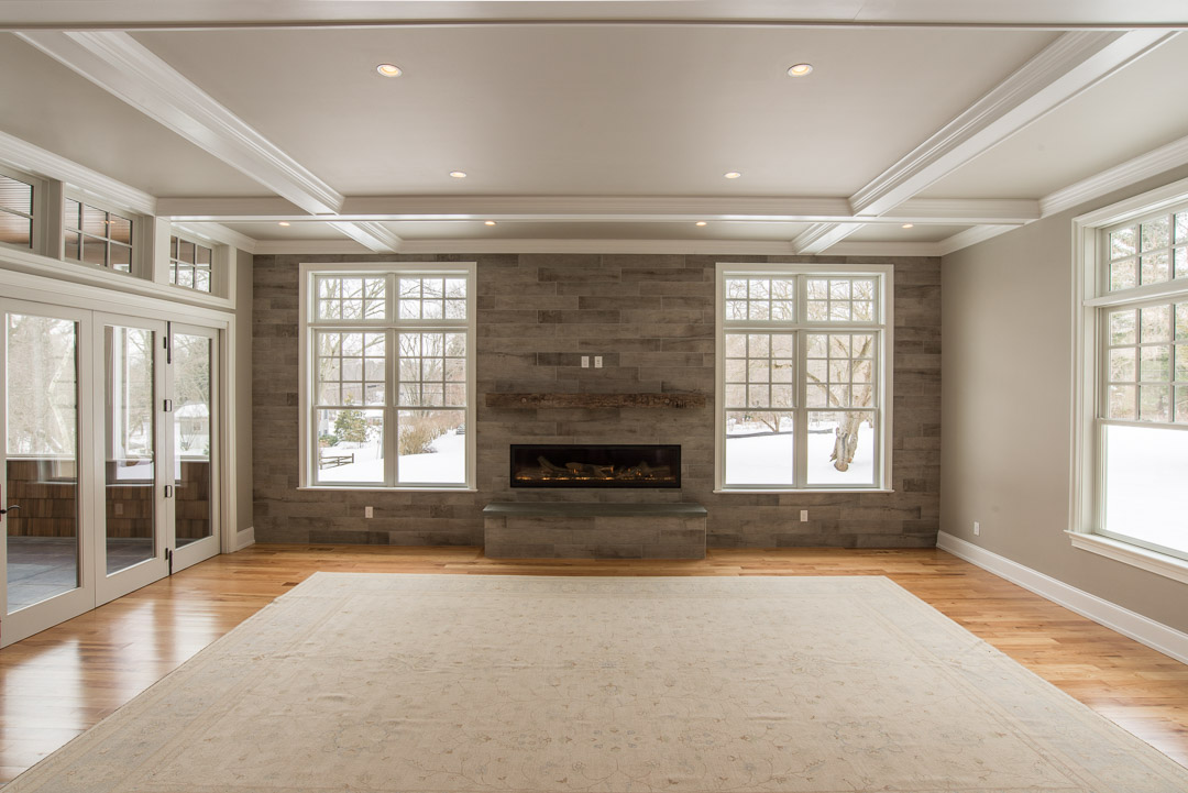 Berwyn Nantucket custom home great room with custom fireplace