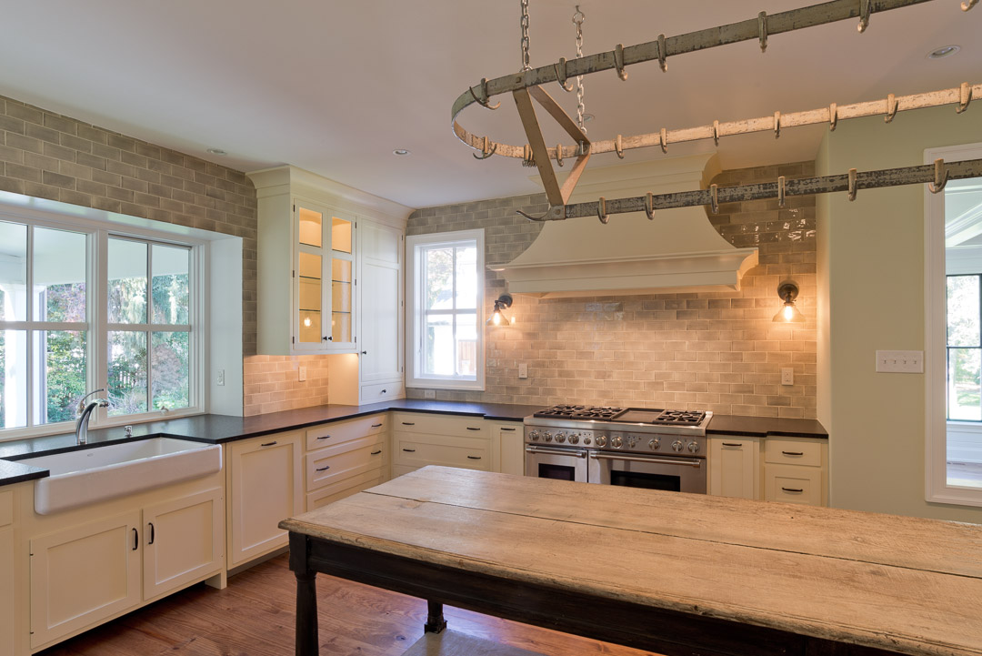 New american farmhouse kitchen featuring custom cabinetry