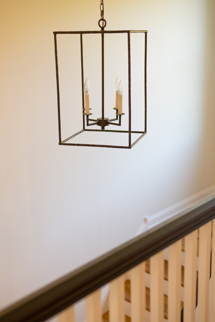 New american farmhouse stairwell candle style lighting selection