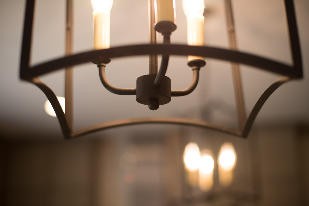 Newtown Square custom home candle style chandelier detail