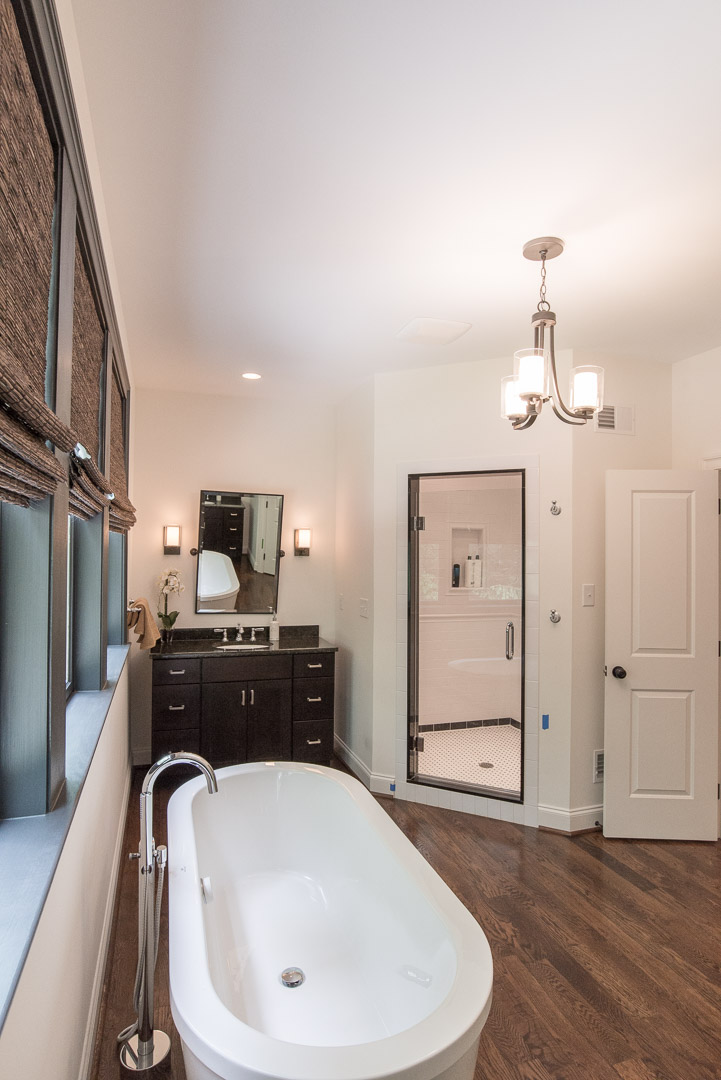 Winslow Interiors Interior Design - bathroom with standalone tub and built-in corner shower enclosure