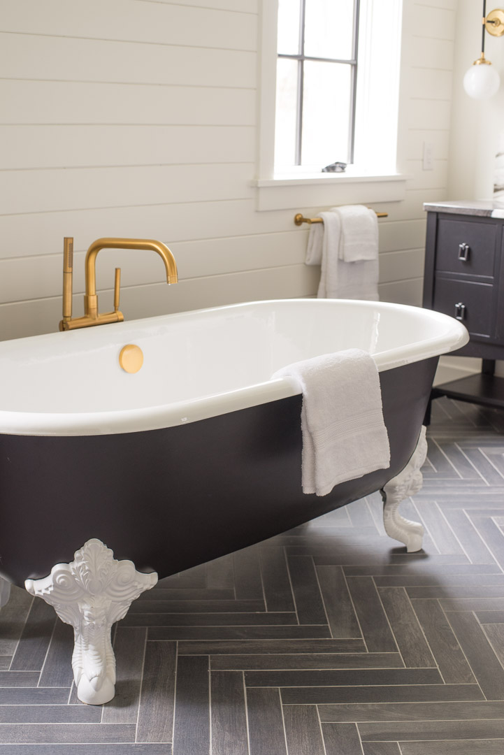 Philadelphia Magazine Design Home 2019 bathroom clawfoot tub and herringbone pattern floor