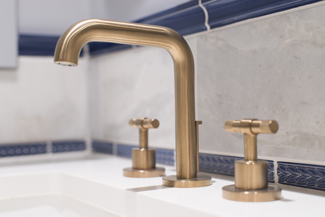 Bryn Mawr Master Bath Renovation brass sink faucet detail with tile backsplash