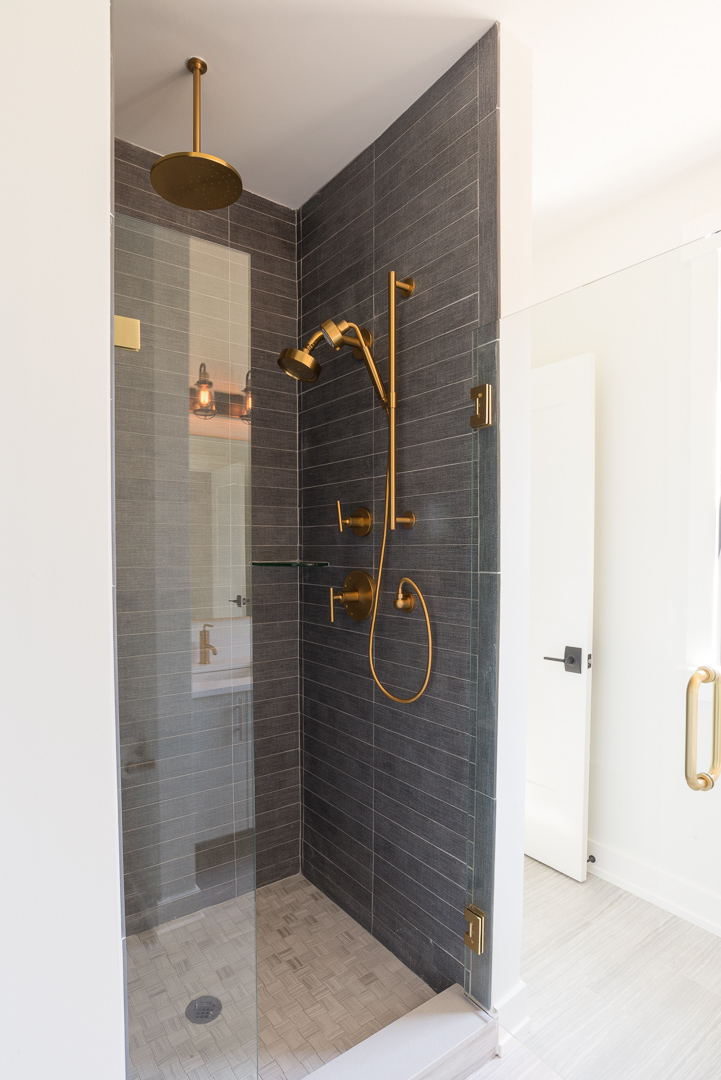 Industrial Chic Townhouses Wayne custom shower enclosure with brass shower heads and faucets
